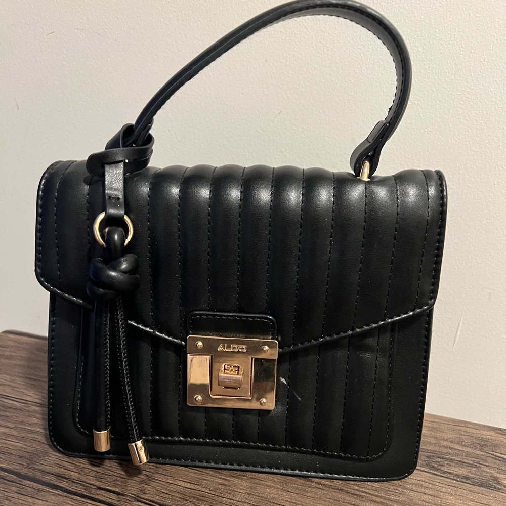 Alto black handbag perfect for everyday use.